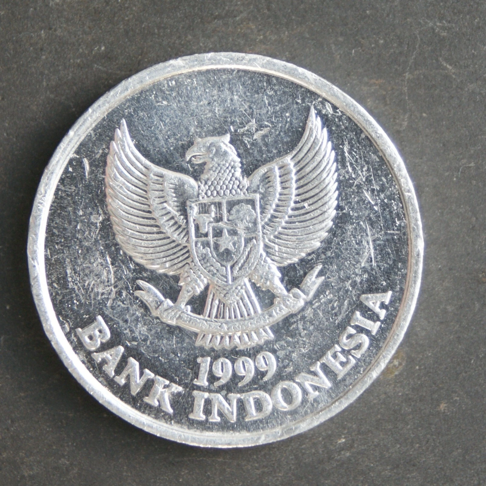 1999 100 Rupiah Coin Indonesia
